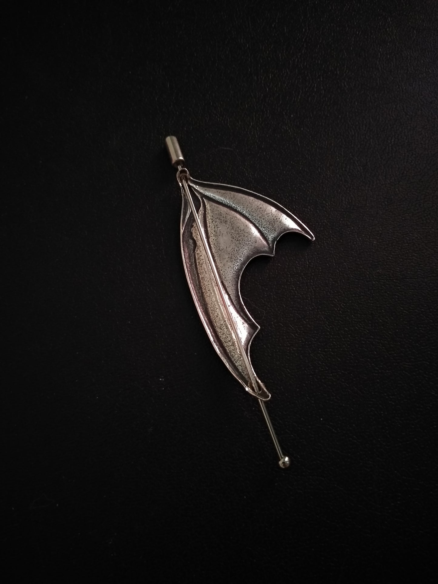 Bat wing pin