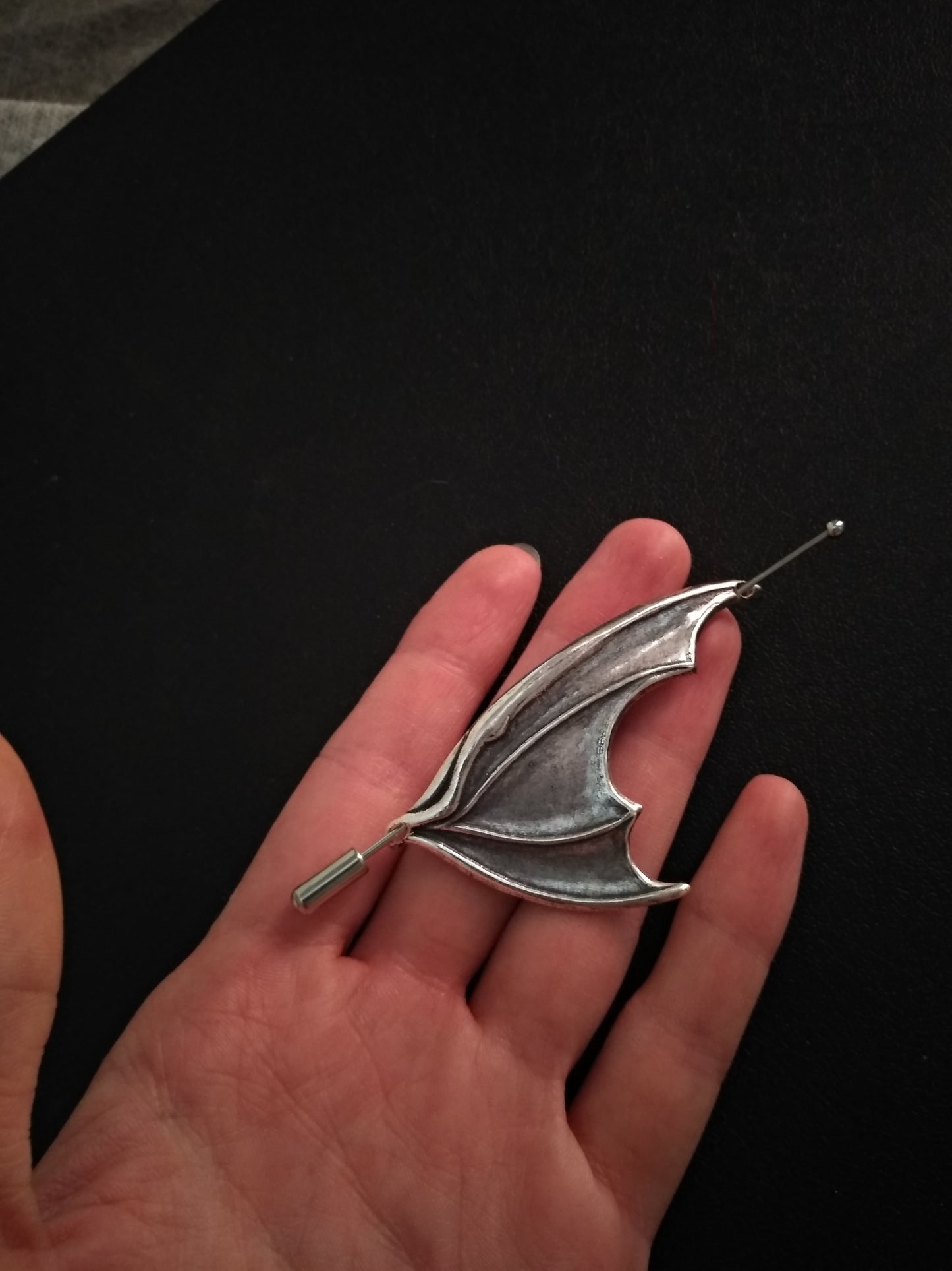 Bat wing pin
