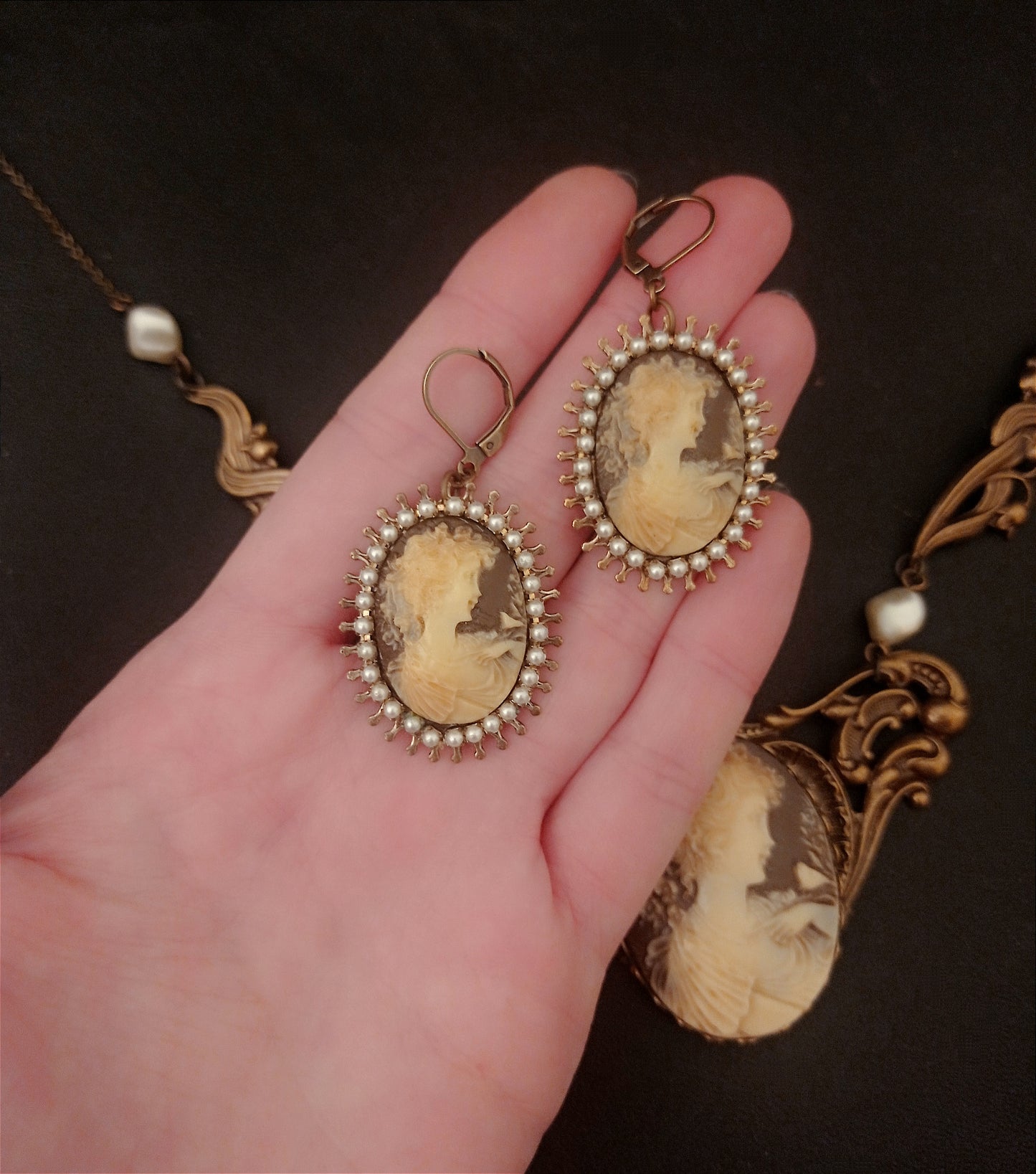Brass set with brown cameos