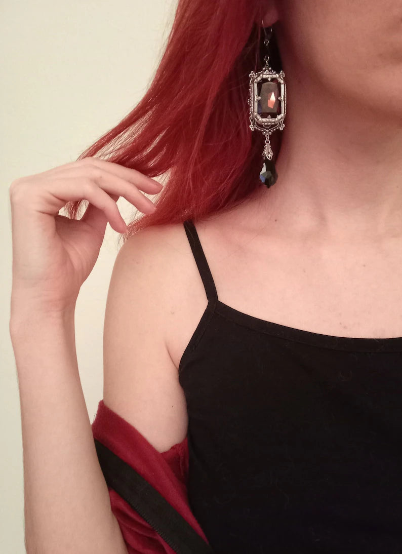 Gothic earring from Grand Gothic Choker Set-Silver and Austrian Crystals worn on model, showcasing black crystal drop and silver frame.