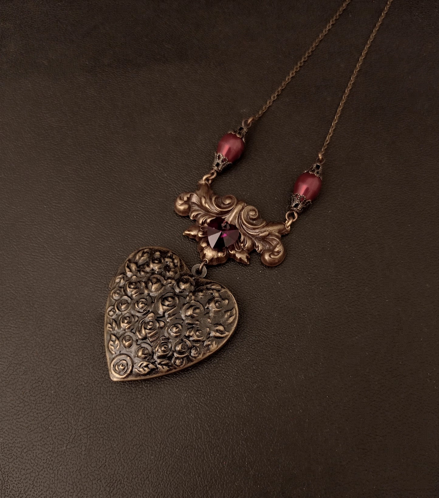 Rose embossed heart locket necklace