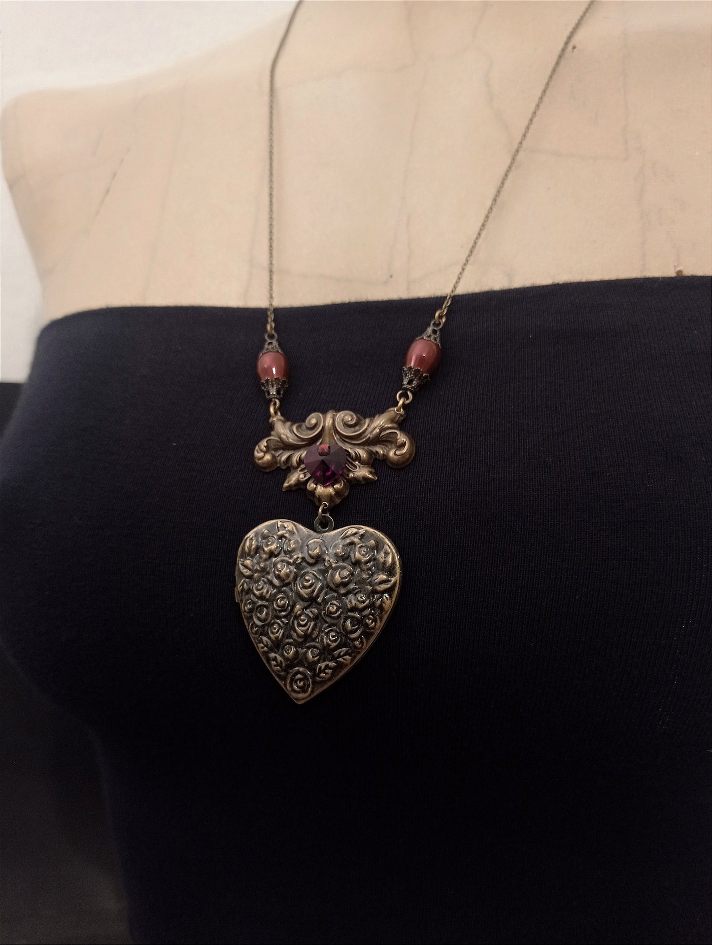 Rose embossed heart locket necklace