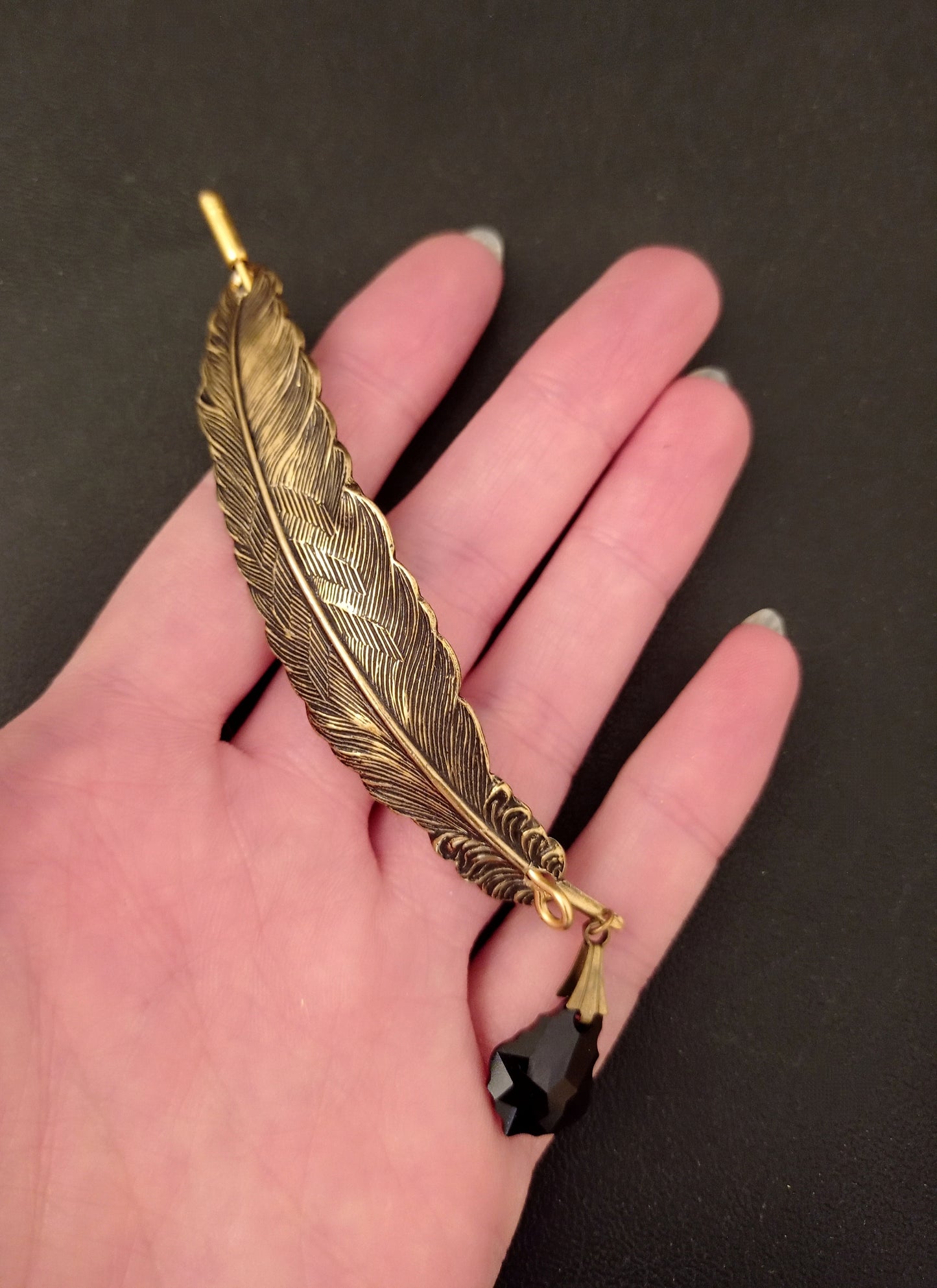 Brass quill brooch