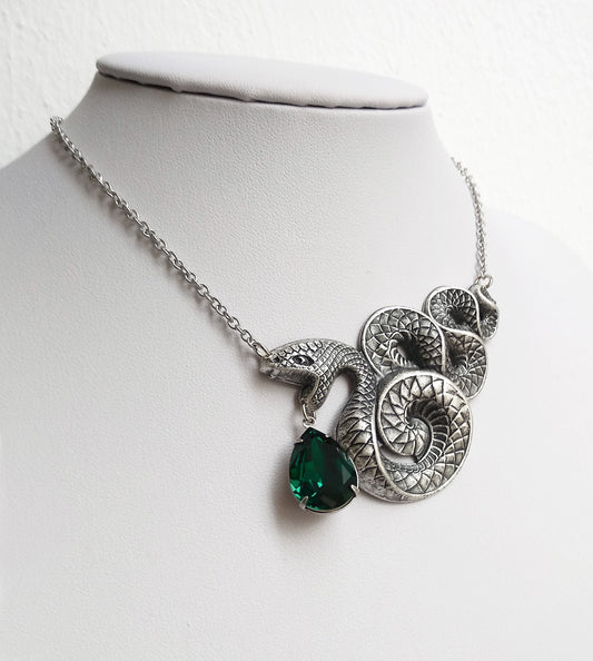 Silver snake necklace with green crystal drop