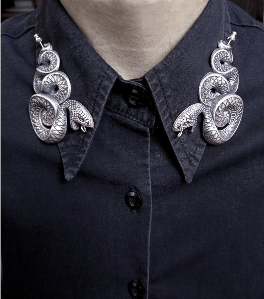 Gothic brooch pin featuring a large sterling silver plated brass snake with amazing details accented by an oxidizing process that gives it a dark antique look.